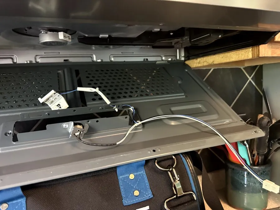 Whirlpool Microwave. Light Socket Holder Replacement in Raleigh — photo 2